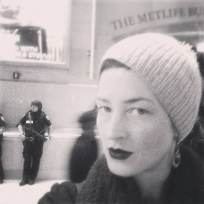 OCTOBER 30th: I asked one of the many young Super-Troupers carrying machine guns if they were anticipating the Joker showing up in Grand Central this morning.  "No, but when we make a big display of men armed for full-on warfare, it lets the public feel there may be some undefined threat lurking around. We want you to know that we are working hard to keep you safe," he said with a smile. Just think of all those gun toting security jobs that are at stake. If there really were no threat, well... there are worse ways to create job security for and by the military.  -Eliza Starbuck ‪#‎createyourownjobsecurity‬ ‪#‎aninsecuremilitaryinasecureworld‬ ‪#‎feareatingmoneypit‬